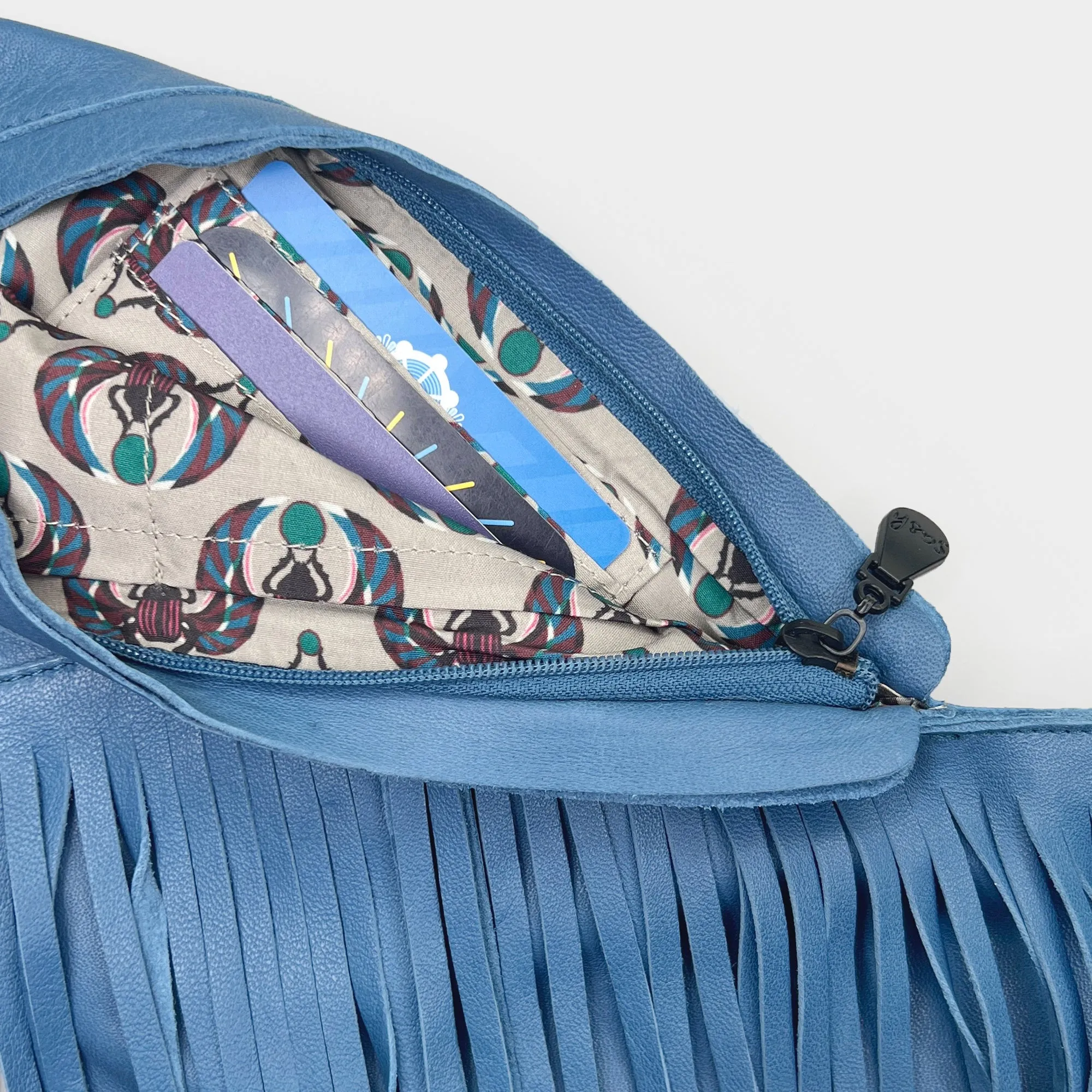 Ceramic Blue Fringe Leather Sash Bag